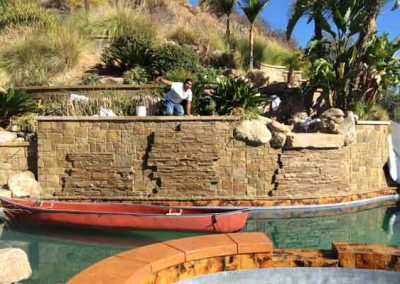 Pool Stone Wall & Pool Tile Cleaned, Sealed and Restored by Alex Stone and Tile Services, Los Angeles, San Fernando Valley, CA.